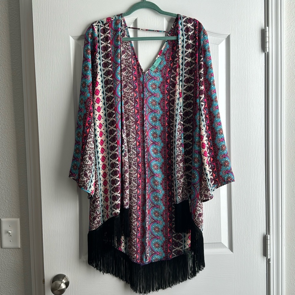 Fringe wrap with bell sleeves